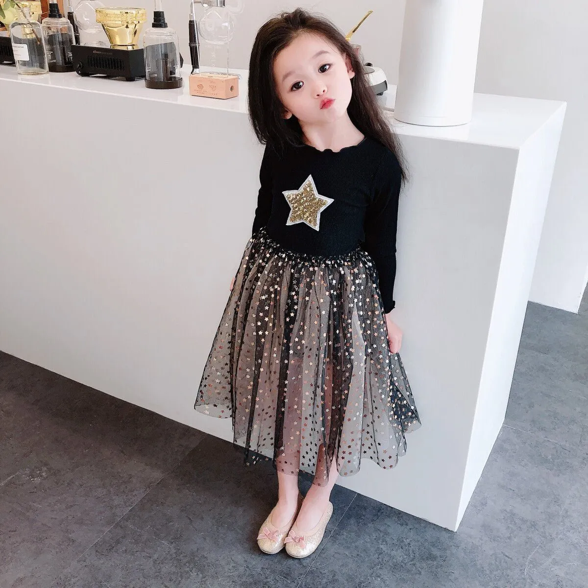 Fancy girls' dress with lace and star print