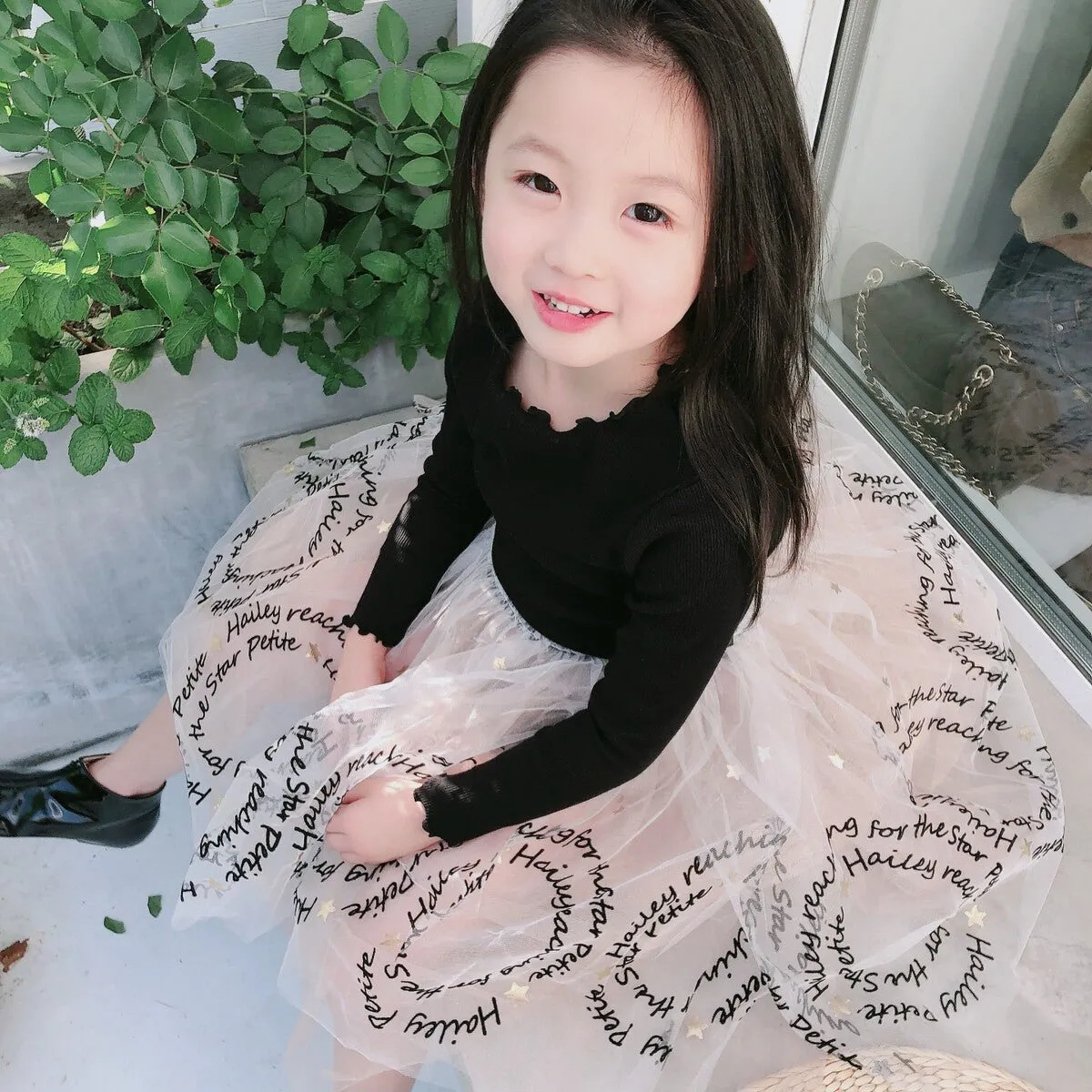 Fancy girls' dress with lace and star print